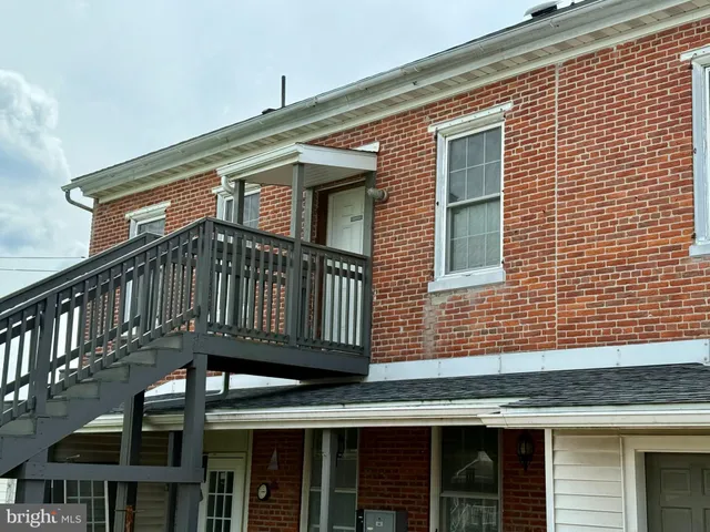 a view of a house with a deck