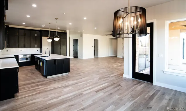 a lobby with furniture and wooden floor