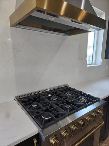 a close up of a stove in the kitchen