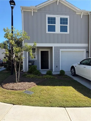 a house view with a garden space