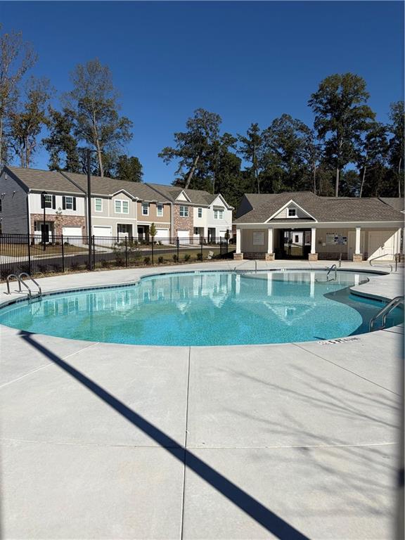 3512 Condor Court Atlanta, GA 30331 - Photo 15 of 19 a view of a white house with a yard and potted plants