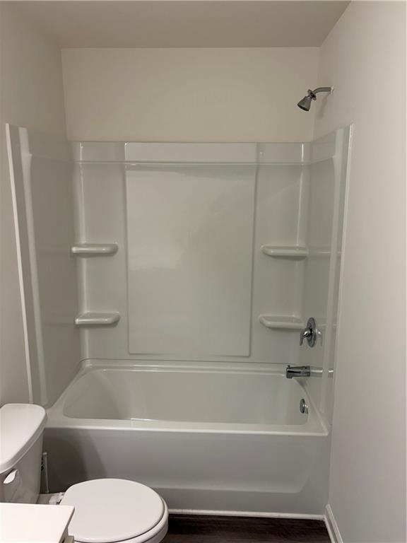 3512 Condor Court Atlanta, GA 30331 - Photo 16 of 19 a bathroom with a toilet and a bathtub
