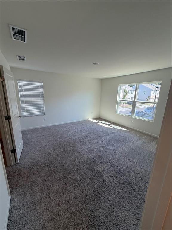 3512 Condor Court Atlanta, GA 30331 - Photo 3 of 19 an empty room with windows and closet