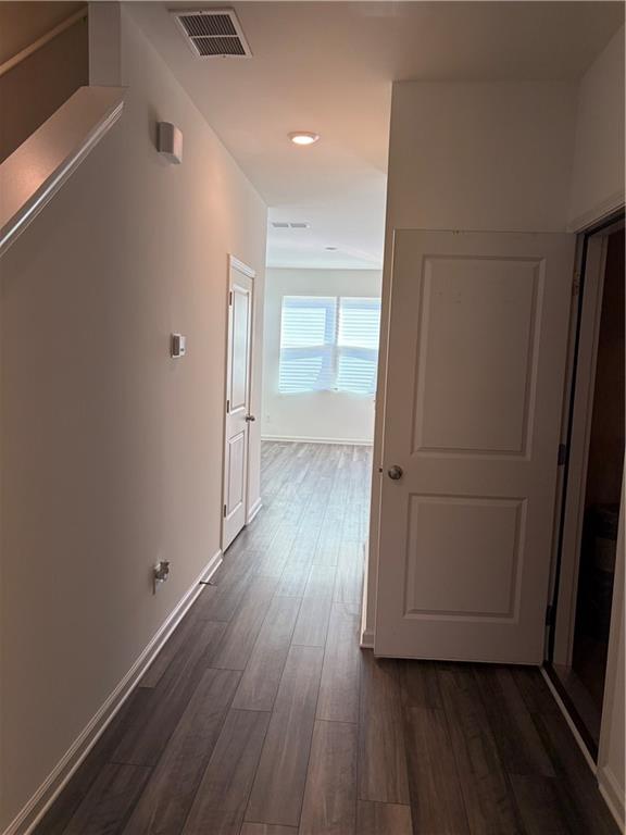 3512 Condor Court Atlanta, GA 30331 - Photo 7 of 19 a view of a hallway with wooden floor