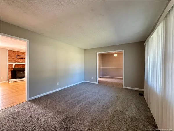 an empty room with window