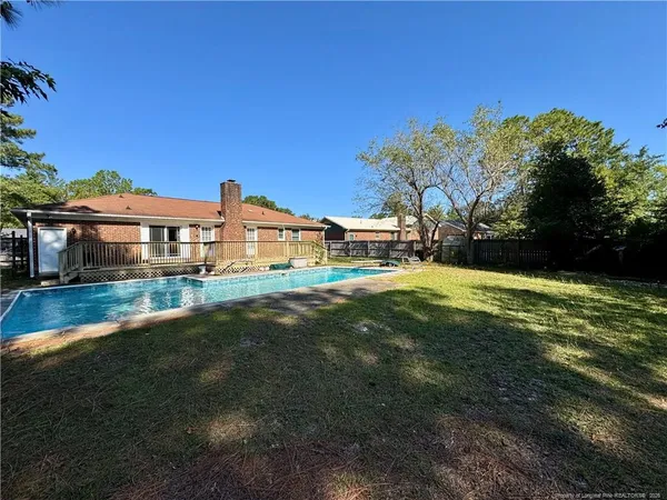 a view of a house with a big yard