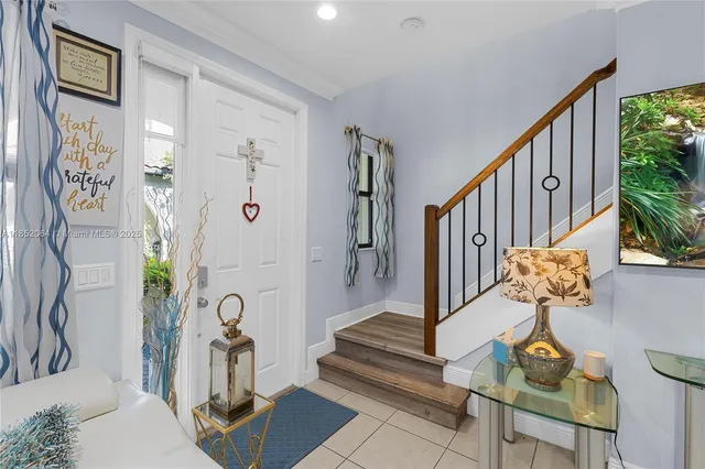 a view of entryway with wooden floor