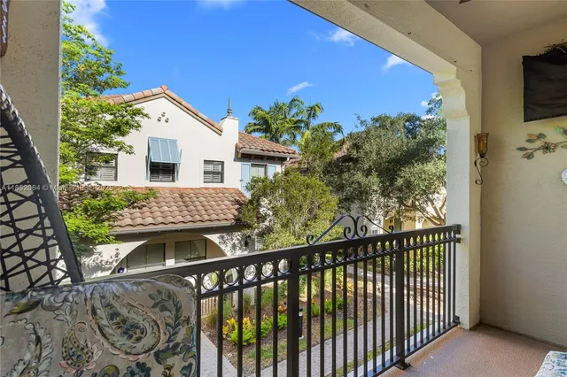 a view of a entryway door with couch