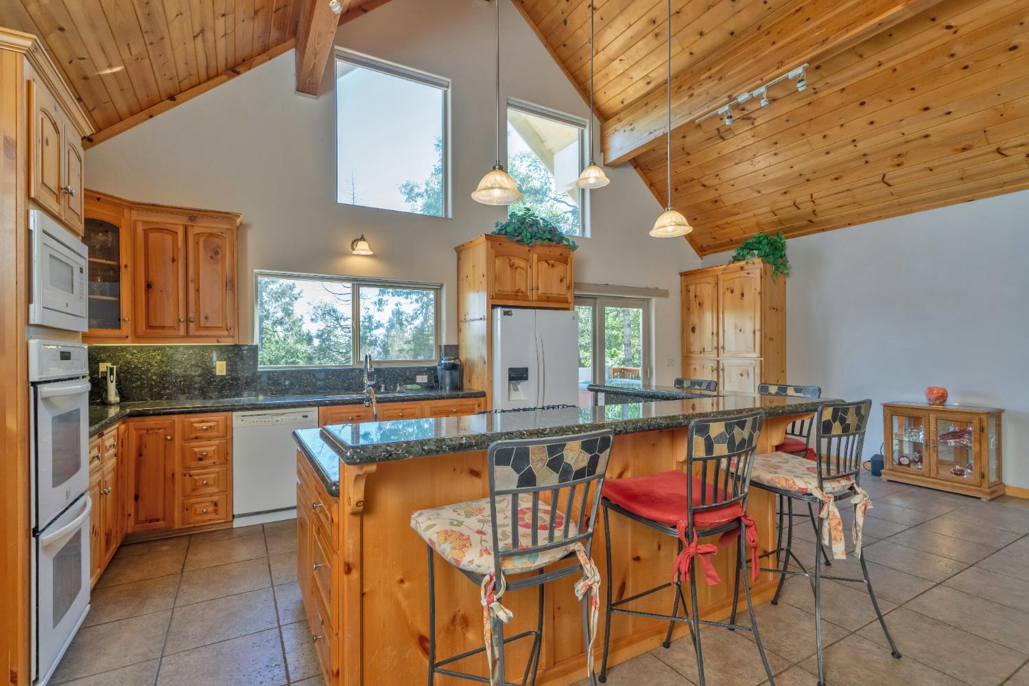 4117 Pearl Road Pollock Pines, CA 95726 - Photo 21 of 47 a very nice looking kitchen with a large window cabinets and stainless steel appliances
