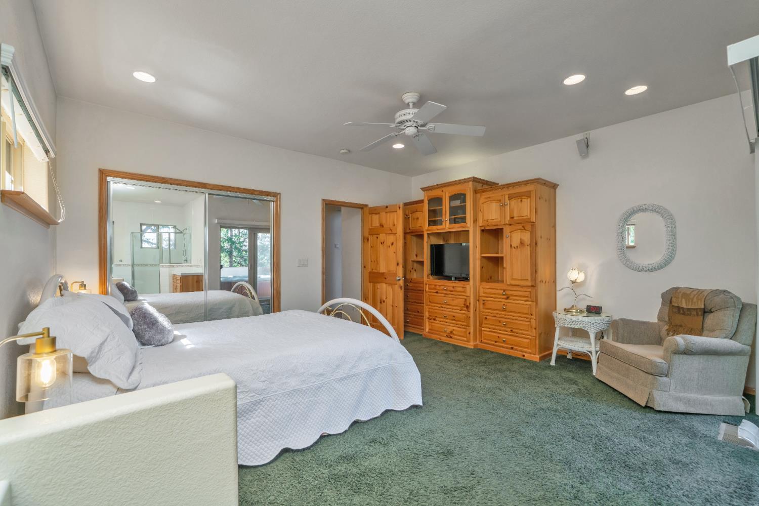 4117 Pearl Road Pollock Pines, CA 95726 - Photo 24 of 47 a bedroom with bed and wooden floor