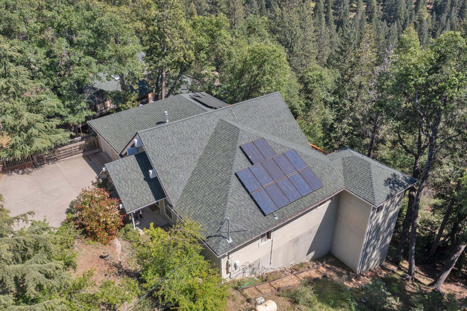 4117 Pearl Road Pollock Pines, CA 95726 - Photo 43 of 47 an aerial view of a house with a yard and trees