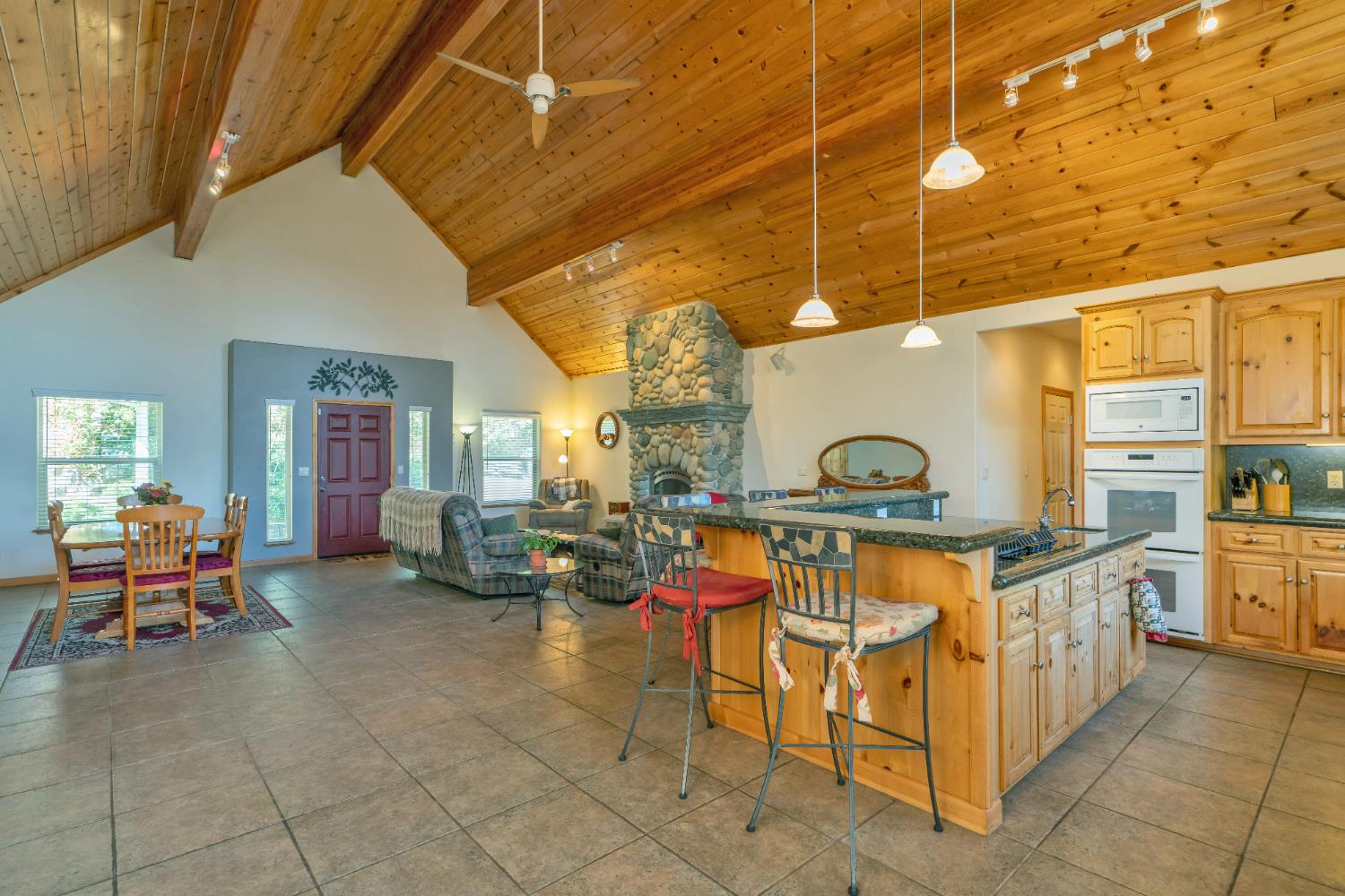 4117 Pearl Road Pollock Pines, CA 95726 - Photo 8 of 47 a kitchen with table and chairs