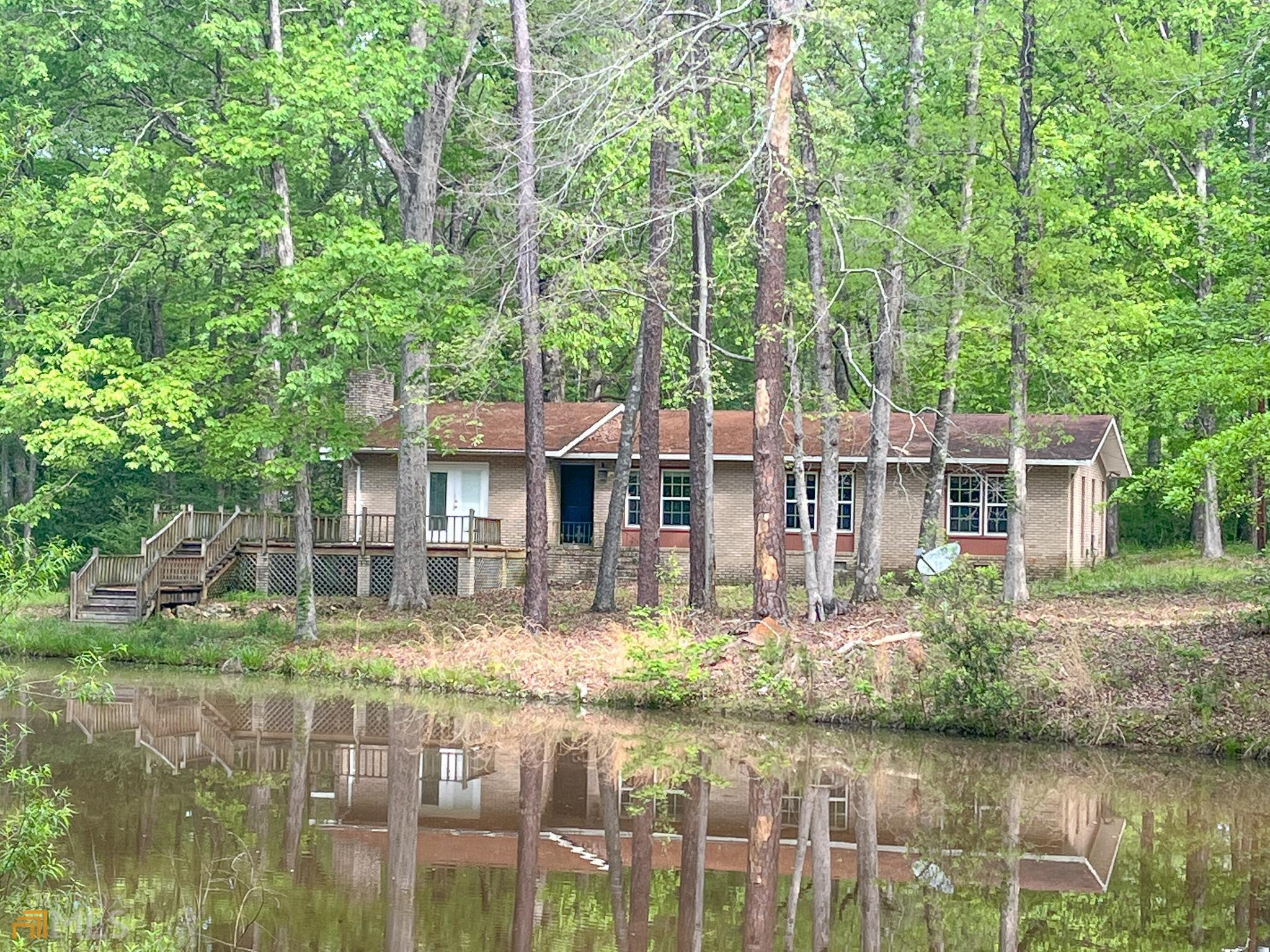 151 Woodland Trails Road Dublin, GA 31021 - Photo 1 of 1 front view of a house with a small yard