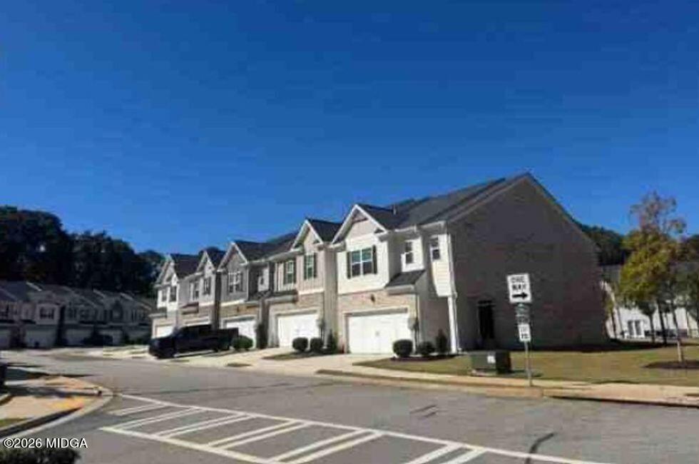 168 Hampton Street McDonough, GA 30253 - Photo 2 of 2 a view of a building with a street