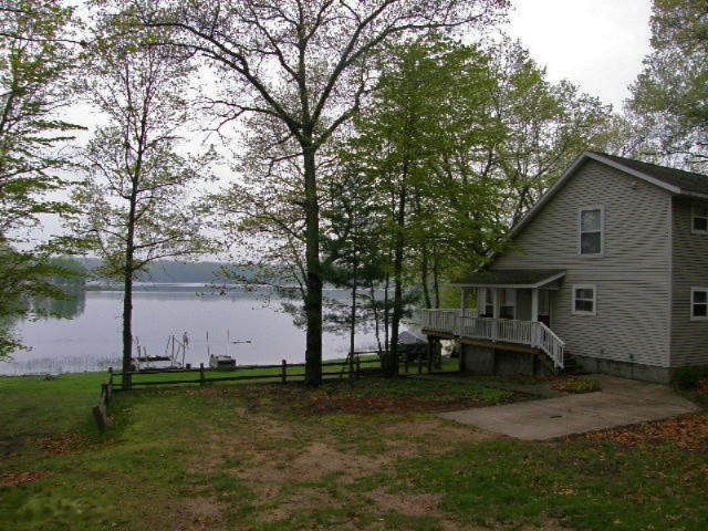7301 North Poplar Road Free Soil, MI 49411 - Photo 1 of 65 Lakefront Home