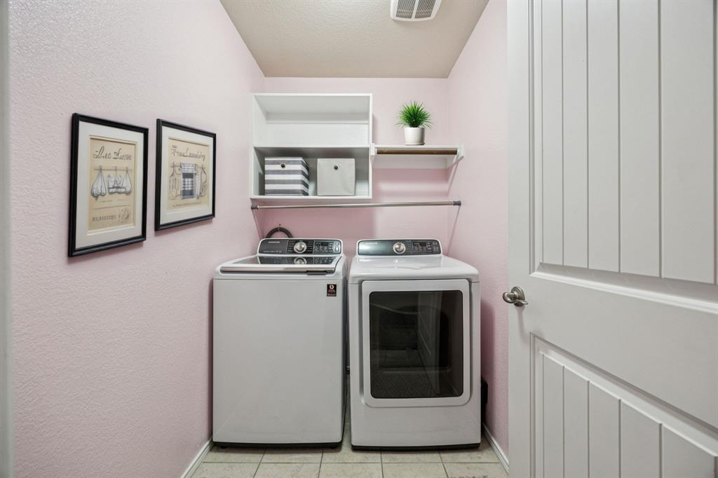 513 Wichita Trail McKinney, TX 75071 - Photo 11 of 15 a utility room with dryer and washer