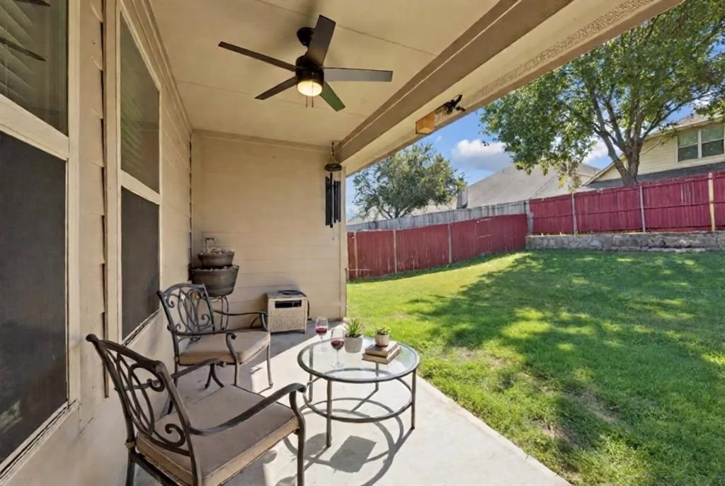 513 Wichita Trail McKinney, TX 75071 - Photo 12 of 15 a backyard of a house with table and chairs