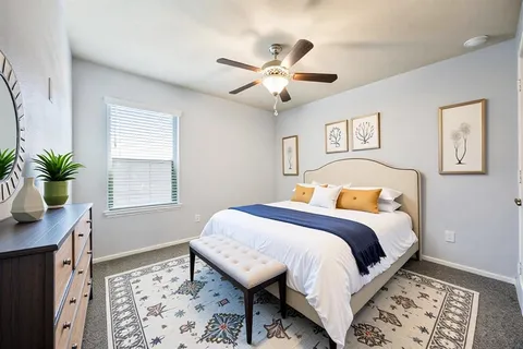 a workspace with furniture and window