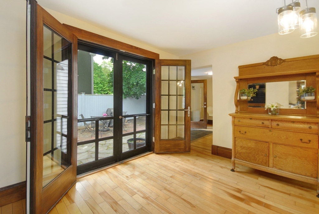 1832 Main Street Concord, MA 01742 - Photo 16 of 25 a bedroom with furniture and a large window