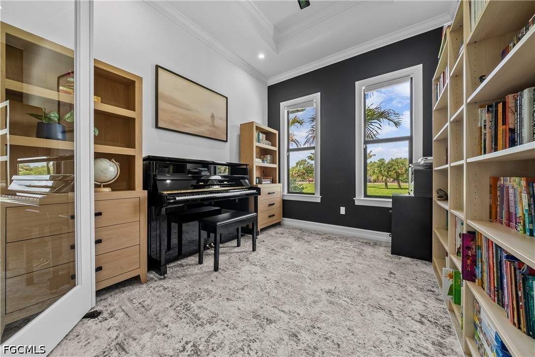 4498 8th Street Northeast Naples, FL 34120 - Photo 14 of 49 a bedroom with furniture and a book shelf