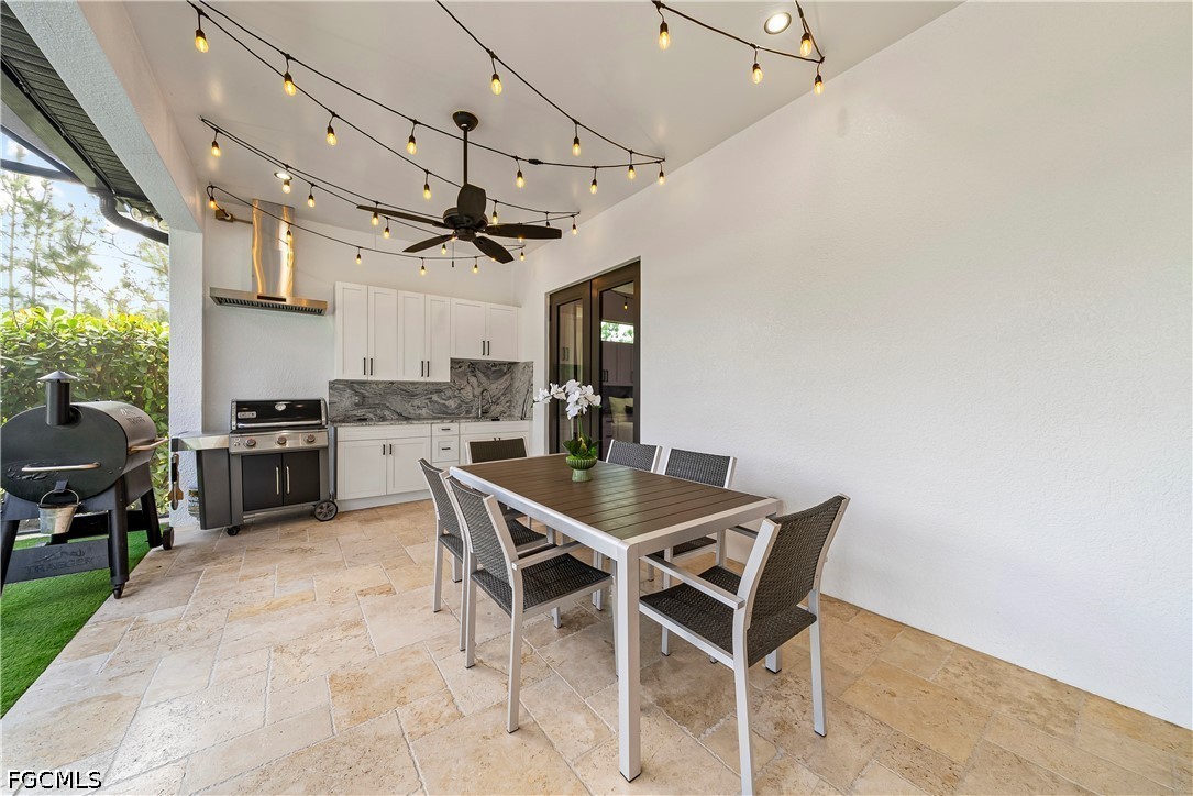 4498 8th Street Northeast Naples, FL 34120 - Photo 25 of 49 a view of a dining room with furniture