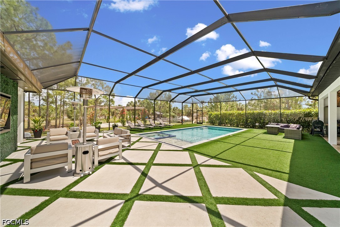 4498 8th Street Northeast Naples, FL 34120 - Photo 28 of 49 a view of a indoor swimming pool