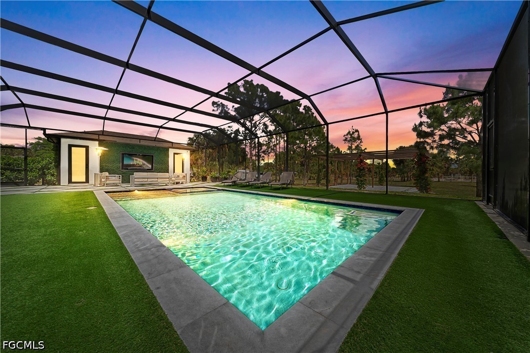 4498 8th Street Northeast Naples, FL 34120 - Photo 3 of 49 a view of a backyard with sitting area