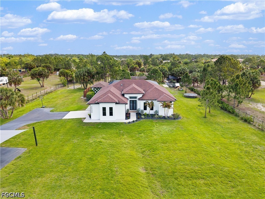 4498 8th Street Northeast Naples, FL 34120 - Photo 41 of 49 an aerial view of a house