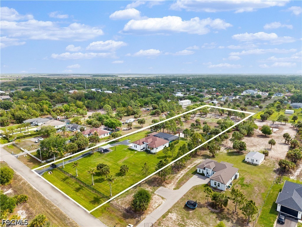 4498 8th Street Northeast Naples, FL 34120 - Photo 42 of 49 a view of a tennis court