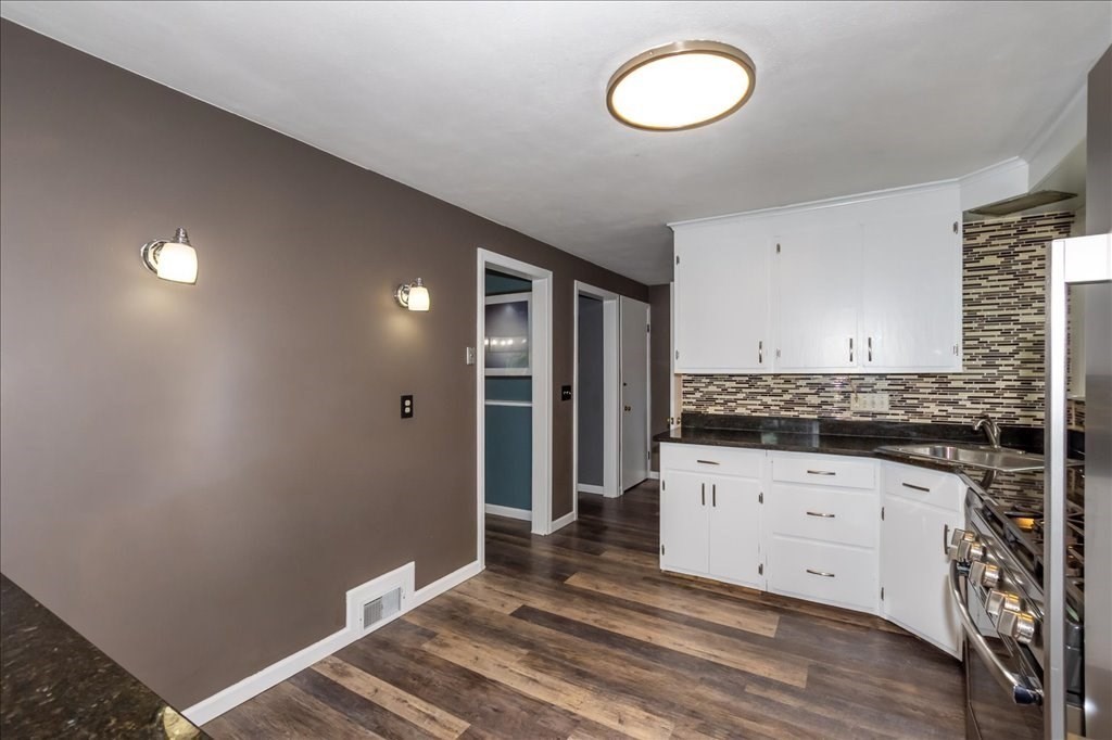 76 Woodland Road Longmeadow, MA 01106 - Photo 20 of 42 a bathroom with a sink and a mirror