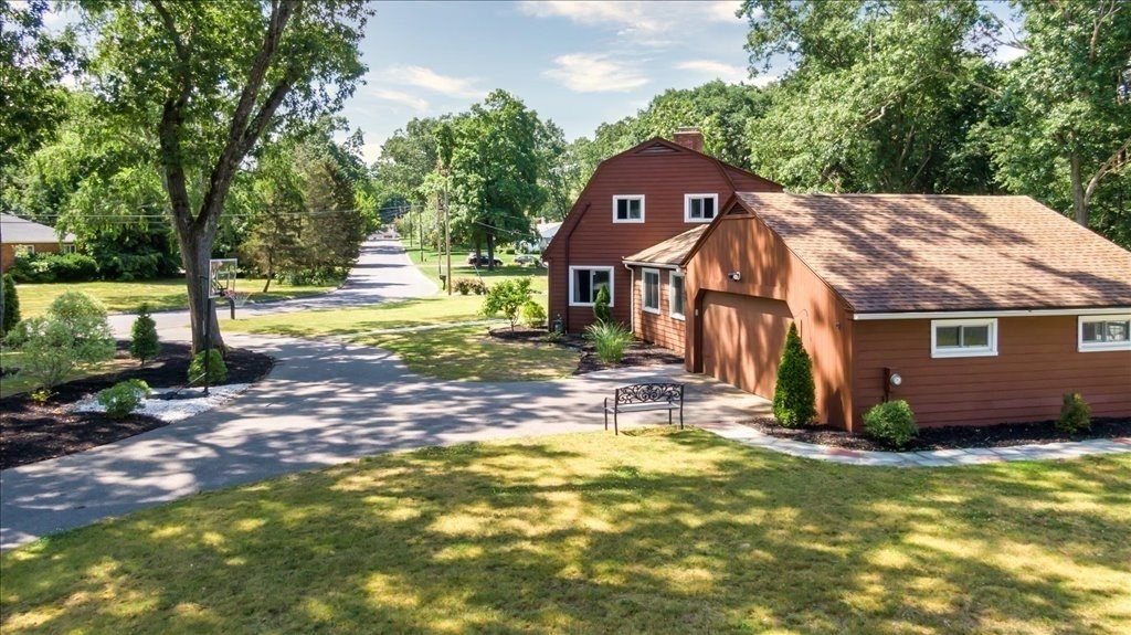 76 Woodland Road Longmeadow, MA 01106 - Photo 2 of 42 a view of a house with a yard