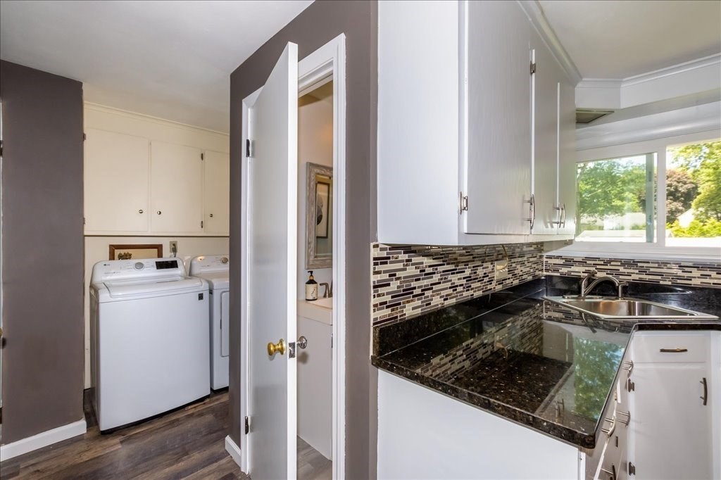 76 Woodland Road Longmeadow, MA 01106 - Photo 21 of 42 a kitchen with a stove and a refrigerator