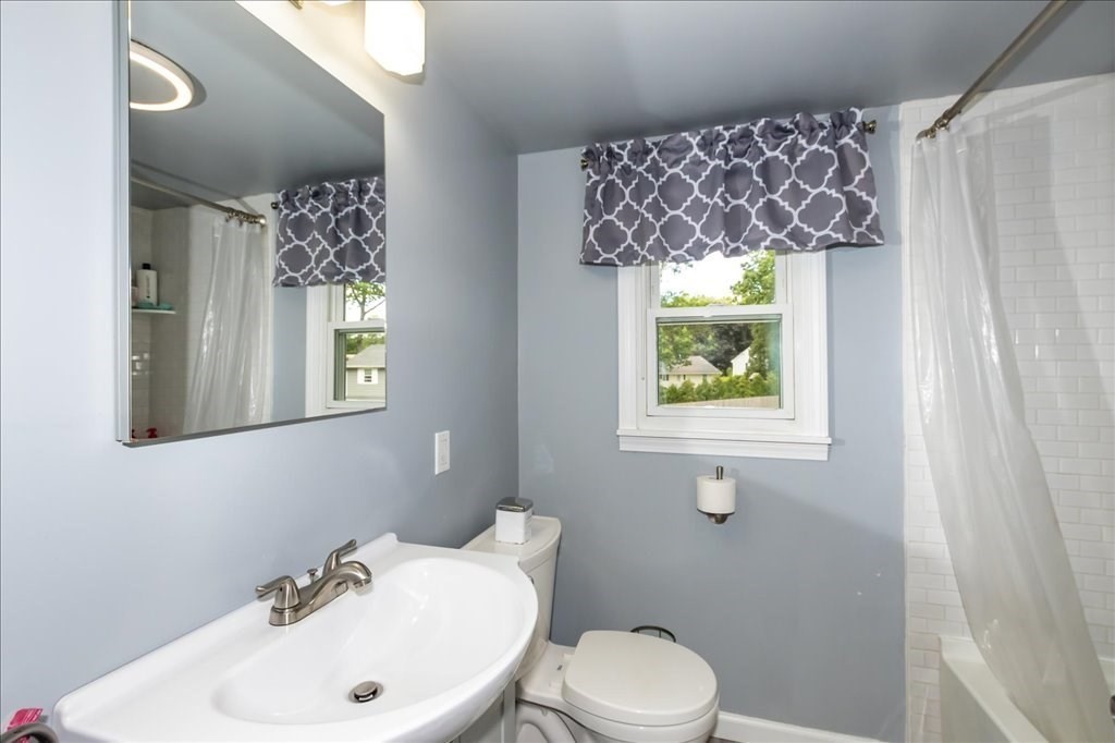 76 Woodland Road Longmeadow, MA 01106 - Photo 28 of 42 a bathroom with a sink and a toilet