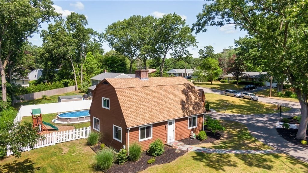 76 Woodland Road Longmeadow, MA 01106 - Photo 37 of 42 an aerial view of a house with yard and patio