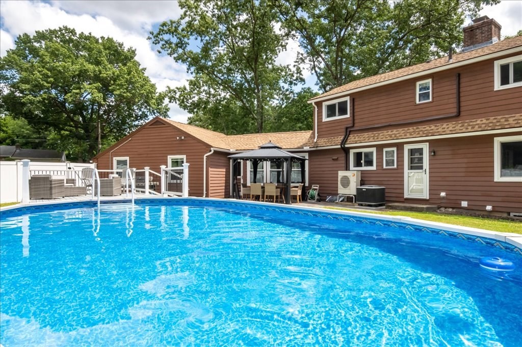76 Woodland Road Longmeadow, MA 01106 - Photo 38 of 42 a view of house with a yard