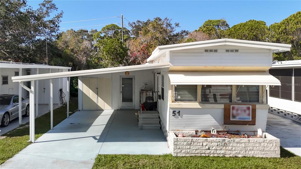 a view of a front of house with large window