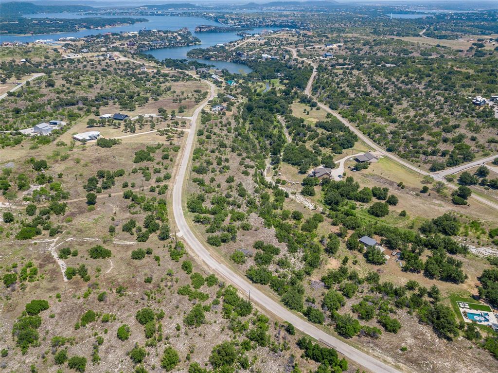 8021 Hells Gate Loop Strawn, TX 76475 - Photo 31 of 39 Aerial view featuring a water view