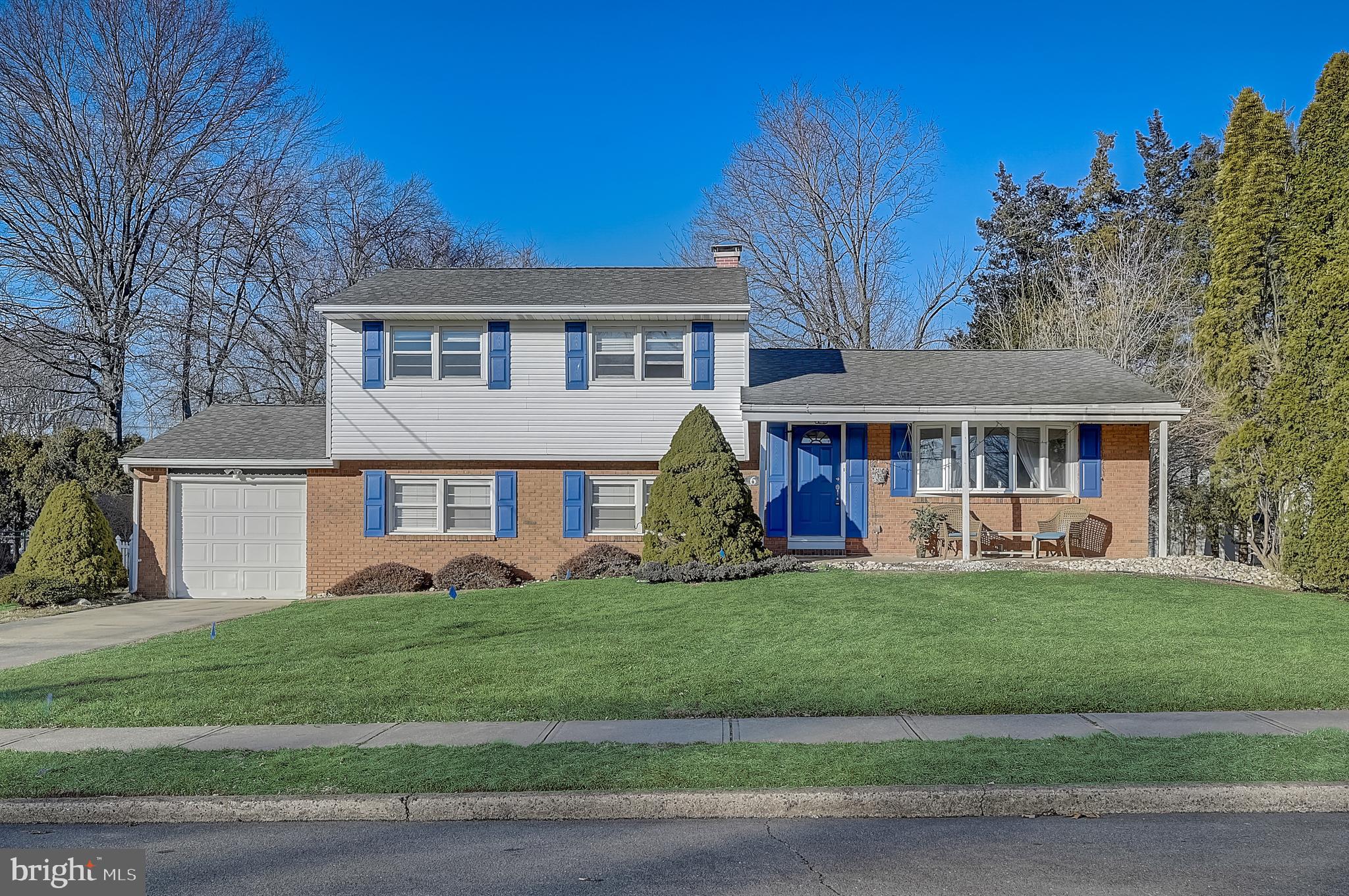 6 Rockland Road Ewing, NJ 08638 - Photo 1 of 37 a front view of a house with a yard and garage