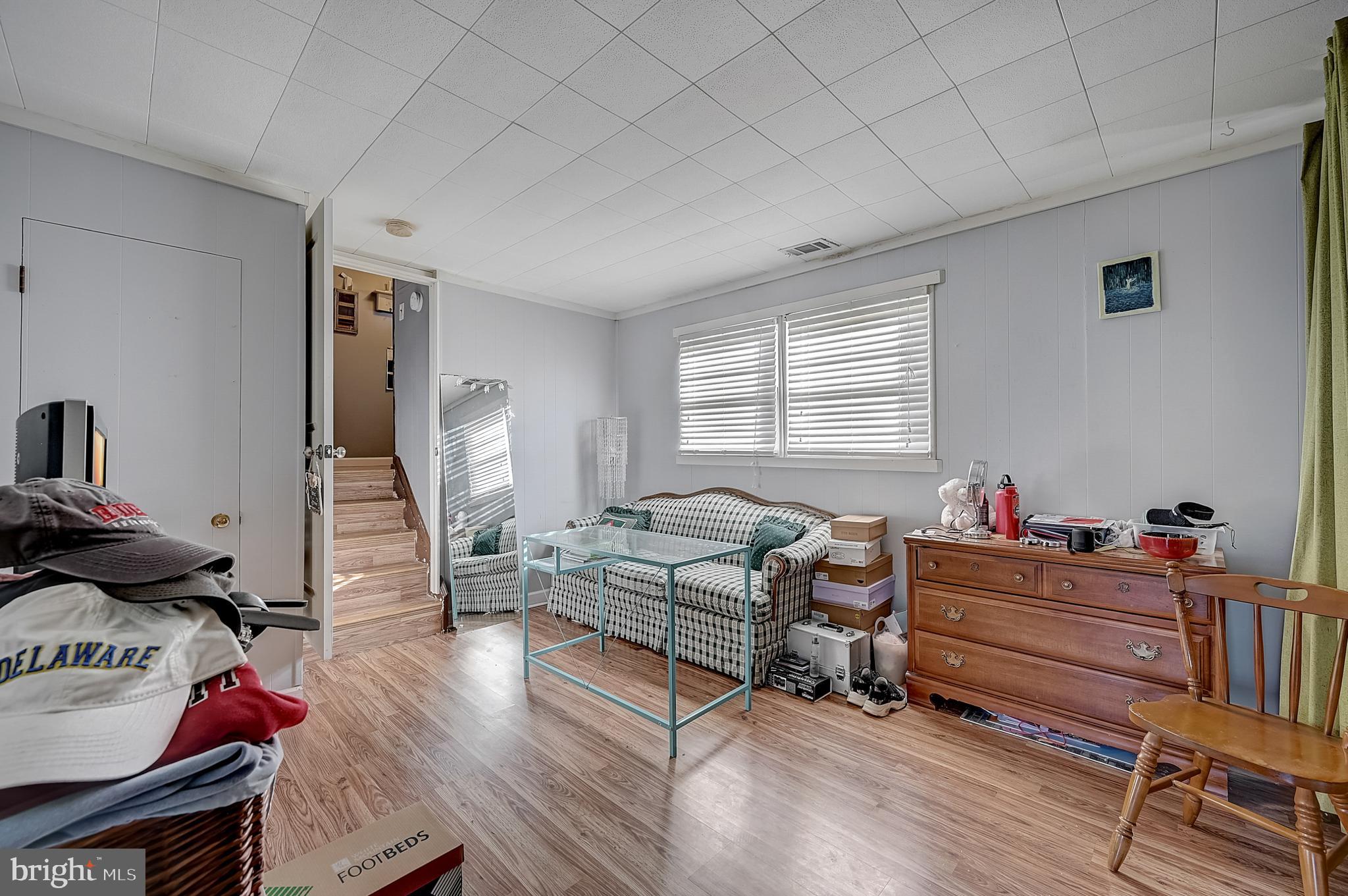 6 Rockland Road Ewing, NJ 08638 - Photo 29 of 37 a living room with furniture and a wooden floor