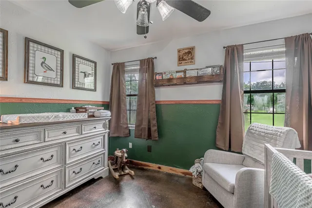 a room with furniture and a window