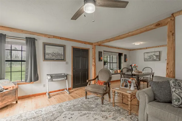 a living room with furniture and a table