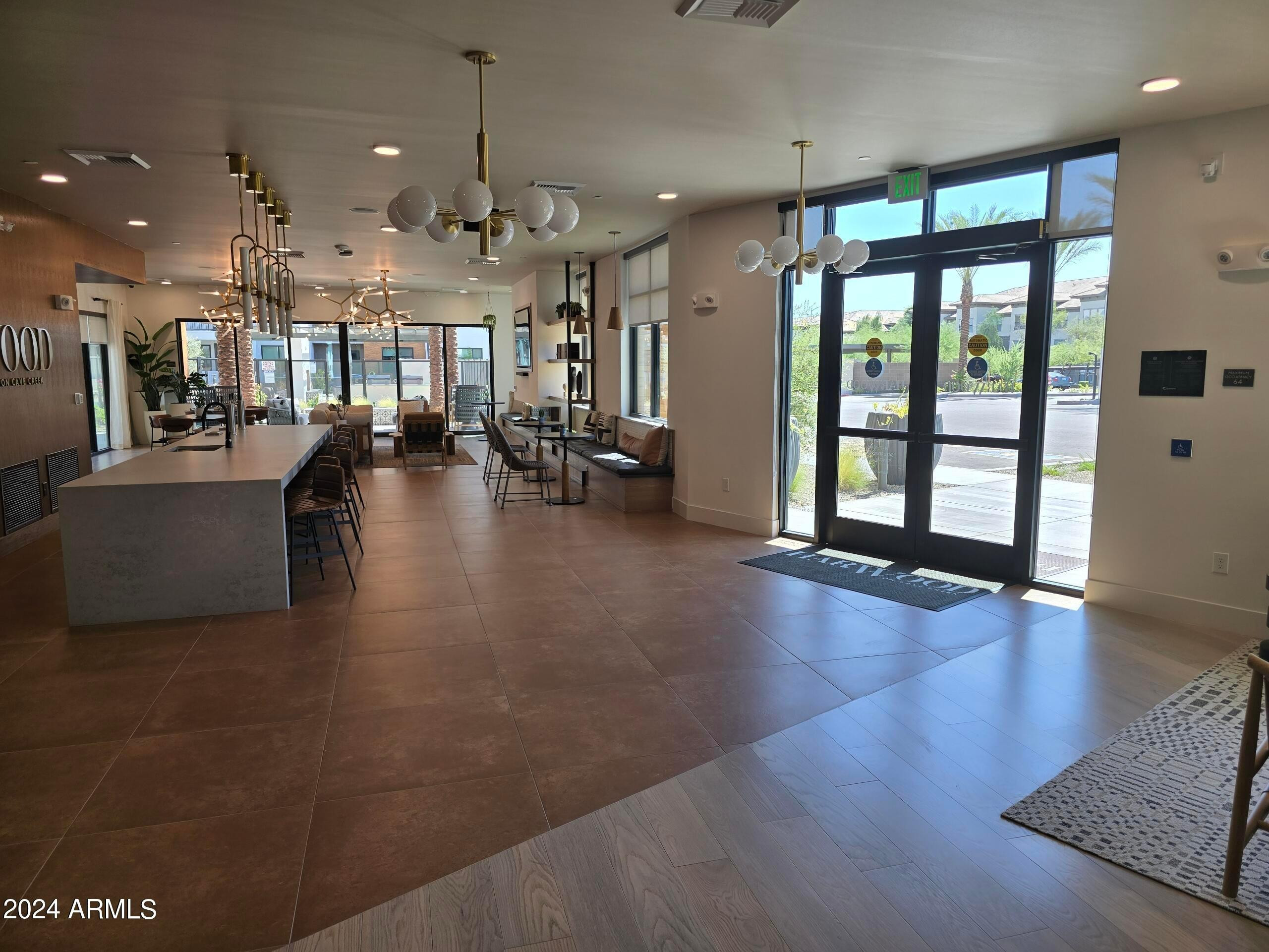 2500 East Marco Polo Road, Unit A1 Phoenix, AZ 85050 - Photo 10 of 15 a view of a living room and chandelier