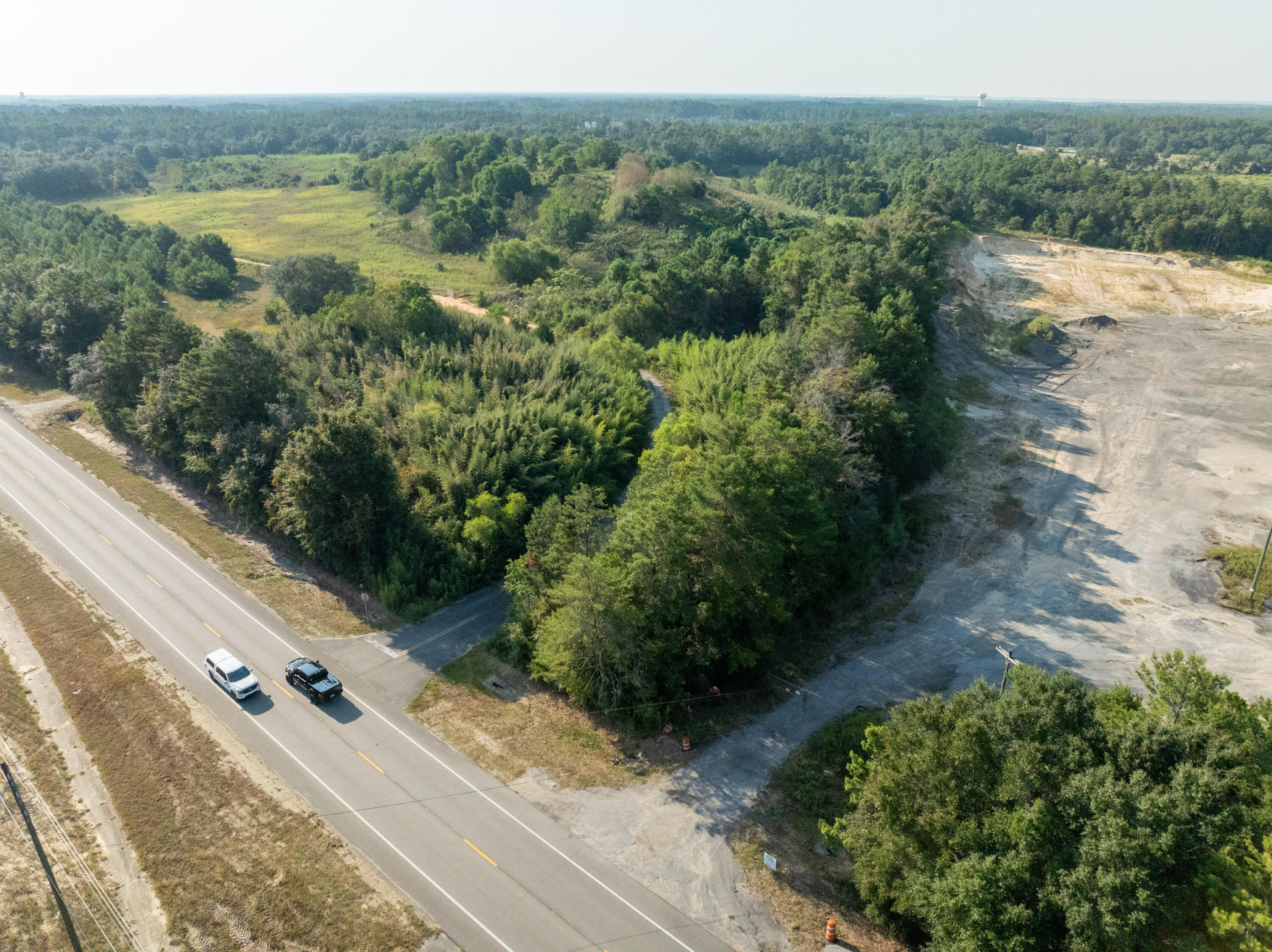 20 West Highway 20 Freeport, FL 32439 - Photo 4 of 24 a view of a city with lush green forest