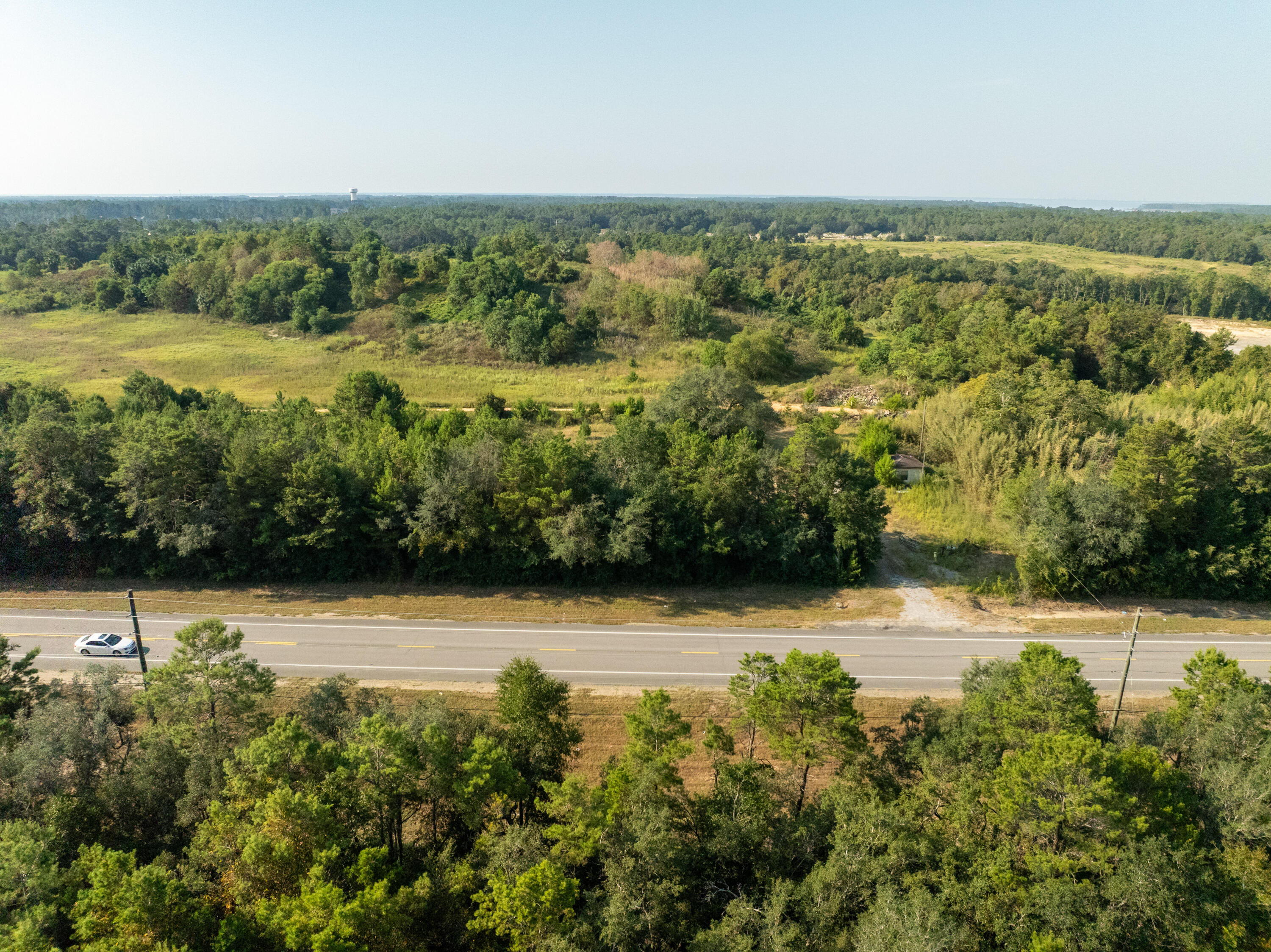 20 West Highway 20 Freeport, FL 32439 - Photo 7 of 24 a view of a lake with houses in the back