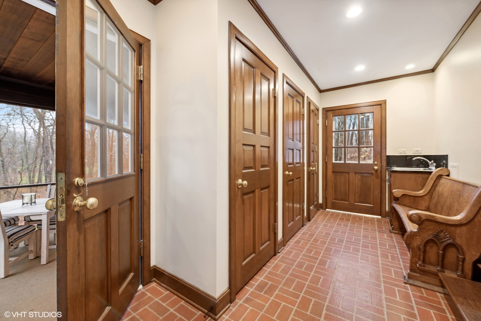 21447 North Andover Road Kildeer, IL 60047 - Photo 12 of 38 a view of a hallway with a car parked in garage