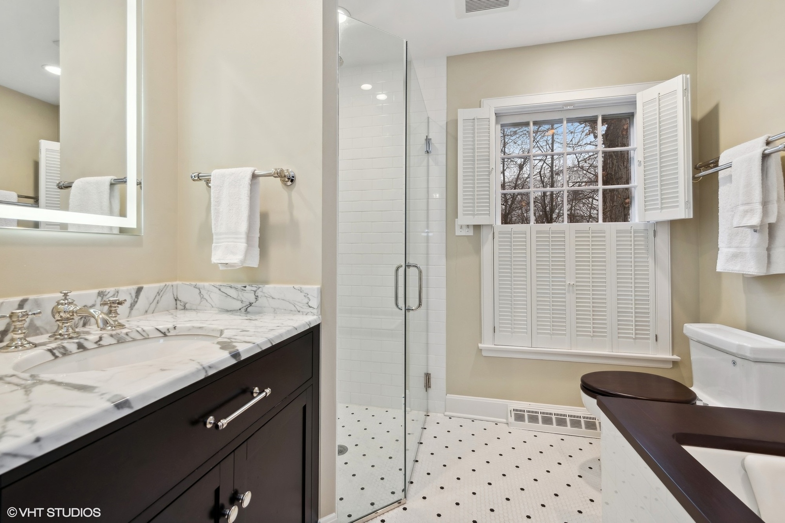 21447 North Andover Road Kildeer, IL 60047 - Photo 18 of 38 a bathroom with a granite countertop sink a mirror and a shower