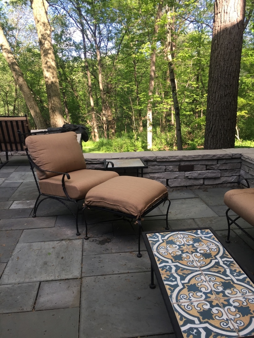 21447 North Andover Road Kildeer, IL 60047 - Photo 32 of 38 a backyard of a house with yard table and chairs