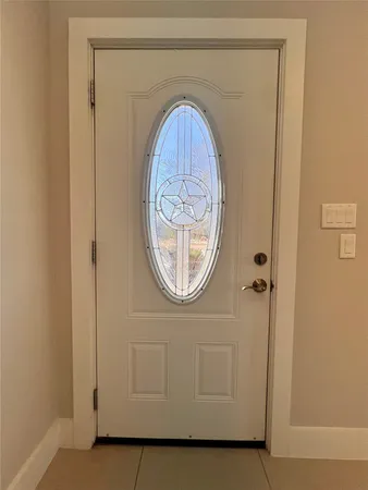 a front view of a house with a hallway