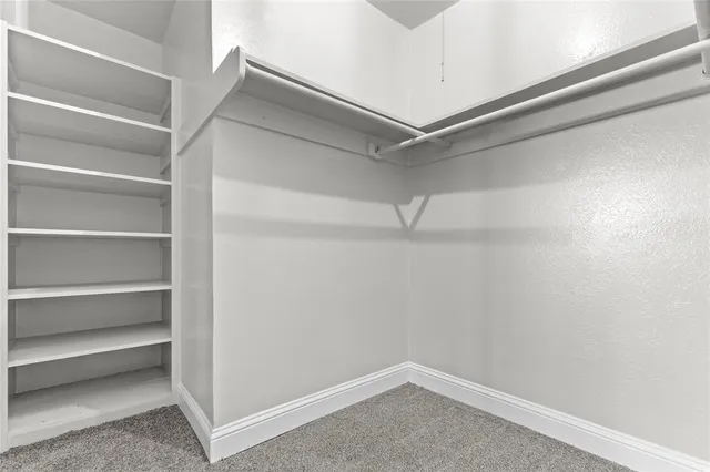 a empty closet with white paint