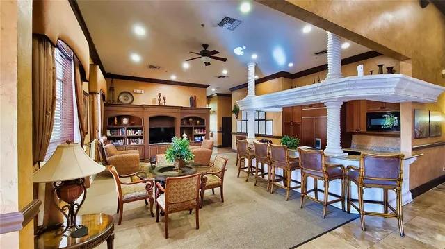 a view of a living room and dining room
